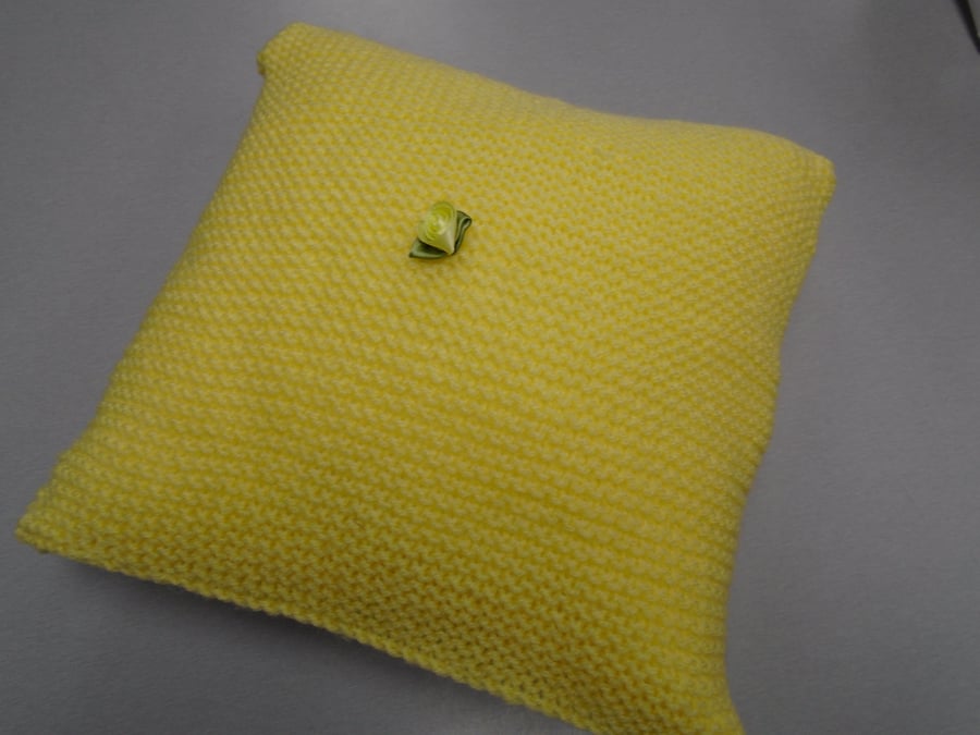 yellow knitted cushion 