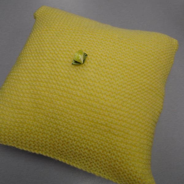 yellow knitted cushion 