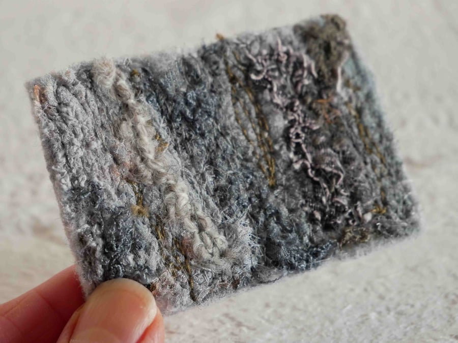 textured grey brooch