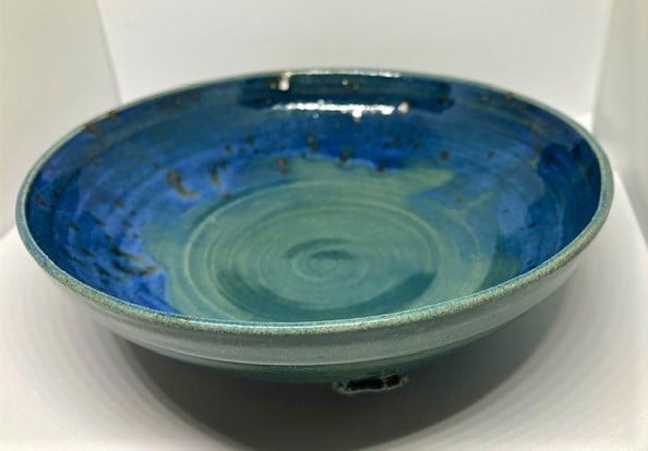hand-thrown bowl, peacock blue glaze with blue and metallic accents