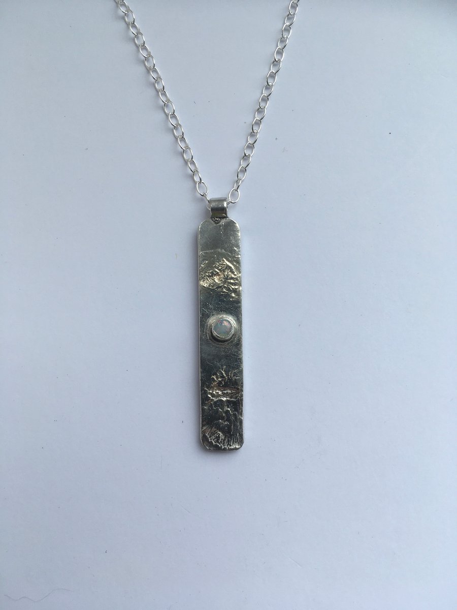 Opal grounding pendant 