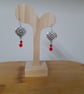 RED AND SILVER FACETED GLASS BEAD EARRINGS. - Image 2