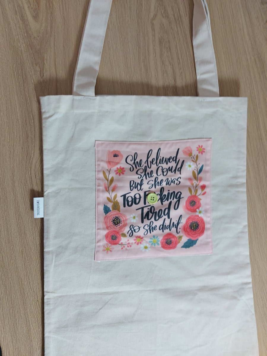 She belived she could tote bag 