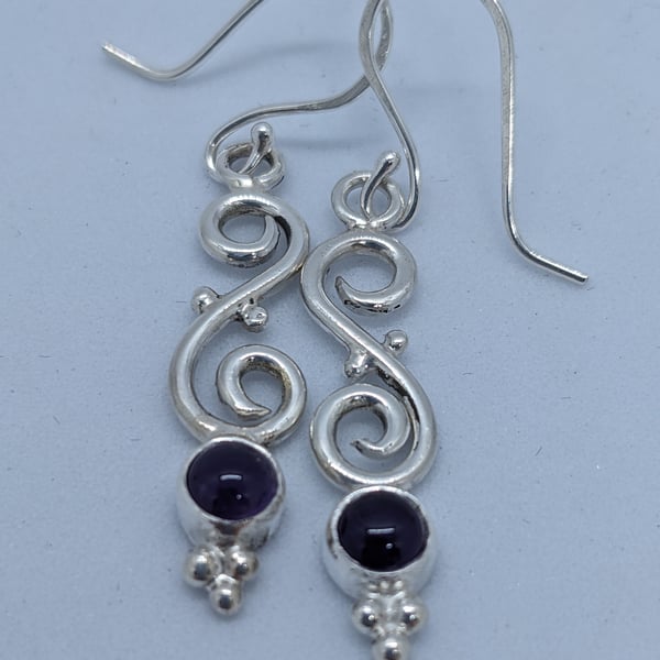 Sterling silver scroll earrings with amethysts