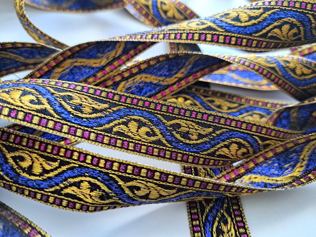 4 metres of blue, red and gold ribbon, 20mm wide