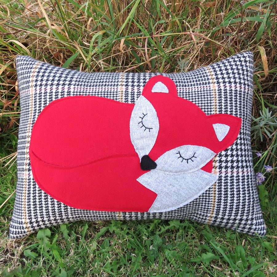 Snoozy fox.  A tartan cushion complete with cushion pad.