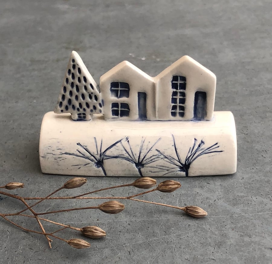 Ceramic row of little houses. 