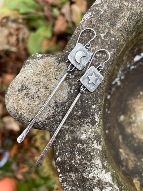 Silver long dangly mismatched earrings with star and moon