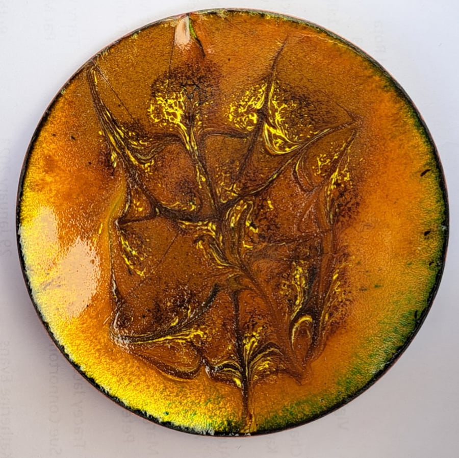 enamel dish scrolled yellow and dark brown on golden brown
