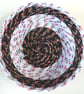 Shallow black and white coiled basket - Image 1