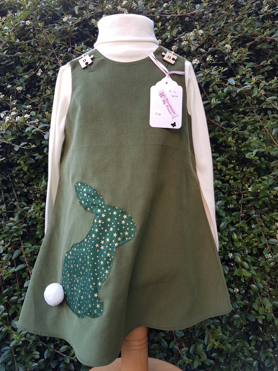 Age: 3-4y. Olive green baby needlecord pinafore dress. 