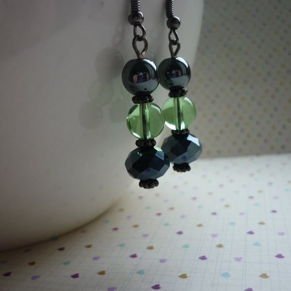 HEMATITE AND PALE GREEN EARRINGS.  748