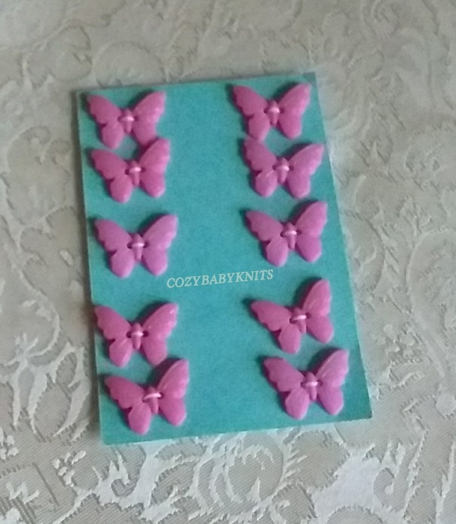 PALE PINK BUTTERFLY BUTTONS WITH TWO HOLES FOR ATTACHING 