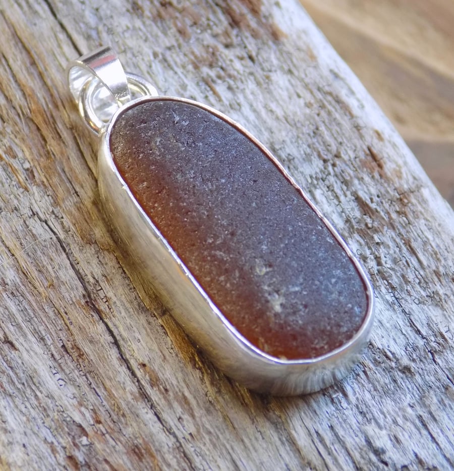 Sea glass and sterling silver bezel set pendant (no chain)