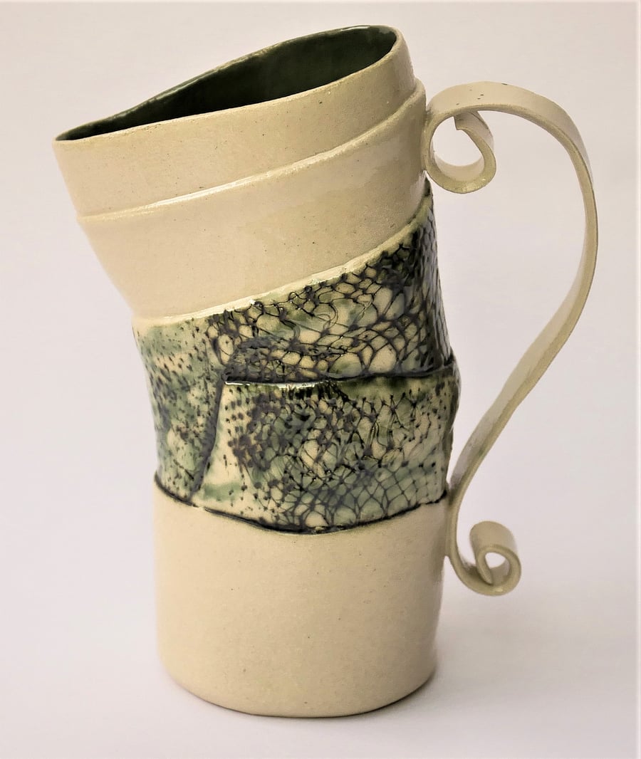 Green and Cream Stoneware Jug