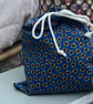 Blue and floral hand made cloth drawstring bag - Image 1