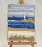 Lighthouse on the Rocks Embroidered Plaque - Image 1