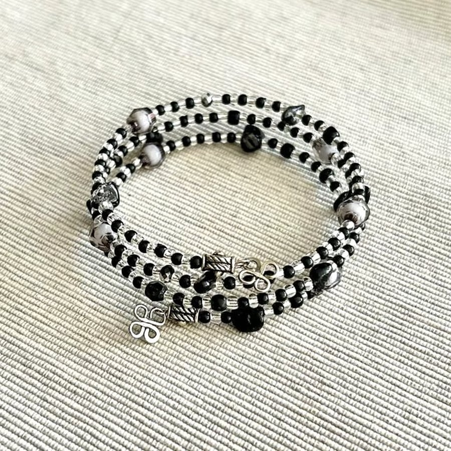 Black and silver bangle made with mixed beads - Stretchy - one size fits all