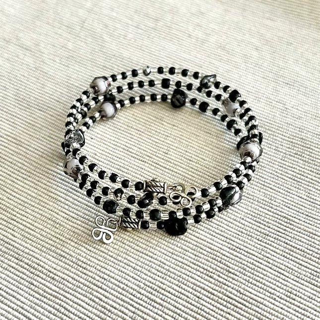 Black and silver bangle made with mixed beads - Stretchy - one size fits all