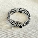 Black and silver bangle made with mixed beads - Stretchy - one size fits all