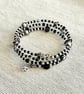 Black and silver bangle made with mixed beads - Stretchy - one size fits all
