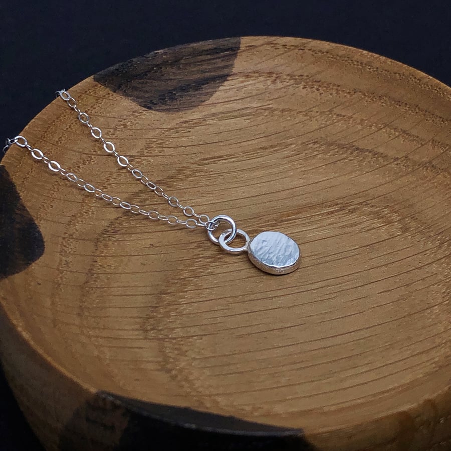 Hammered sterling silver pendant on sterling silver chain, recycled silver.