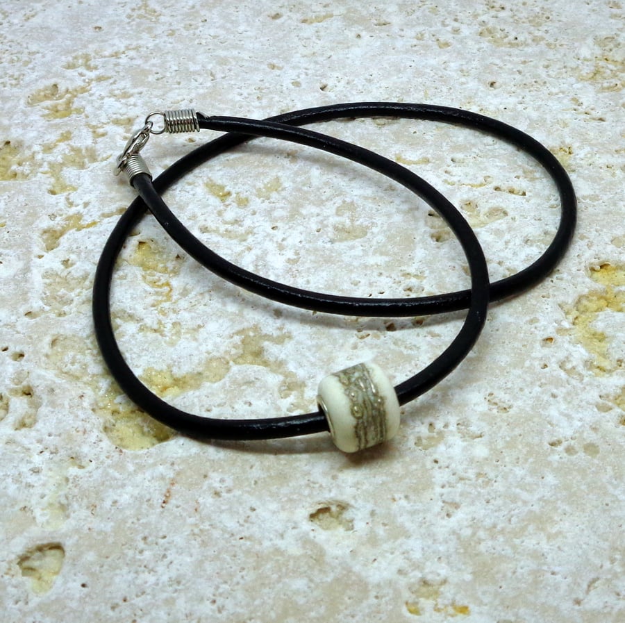 Lampwork ivory glass & fine silver single bead on black cord for neck or wrist
