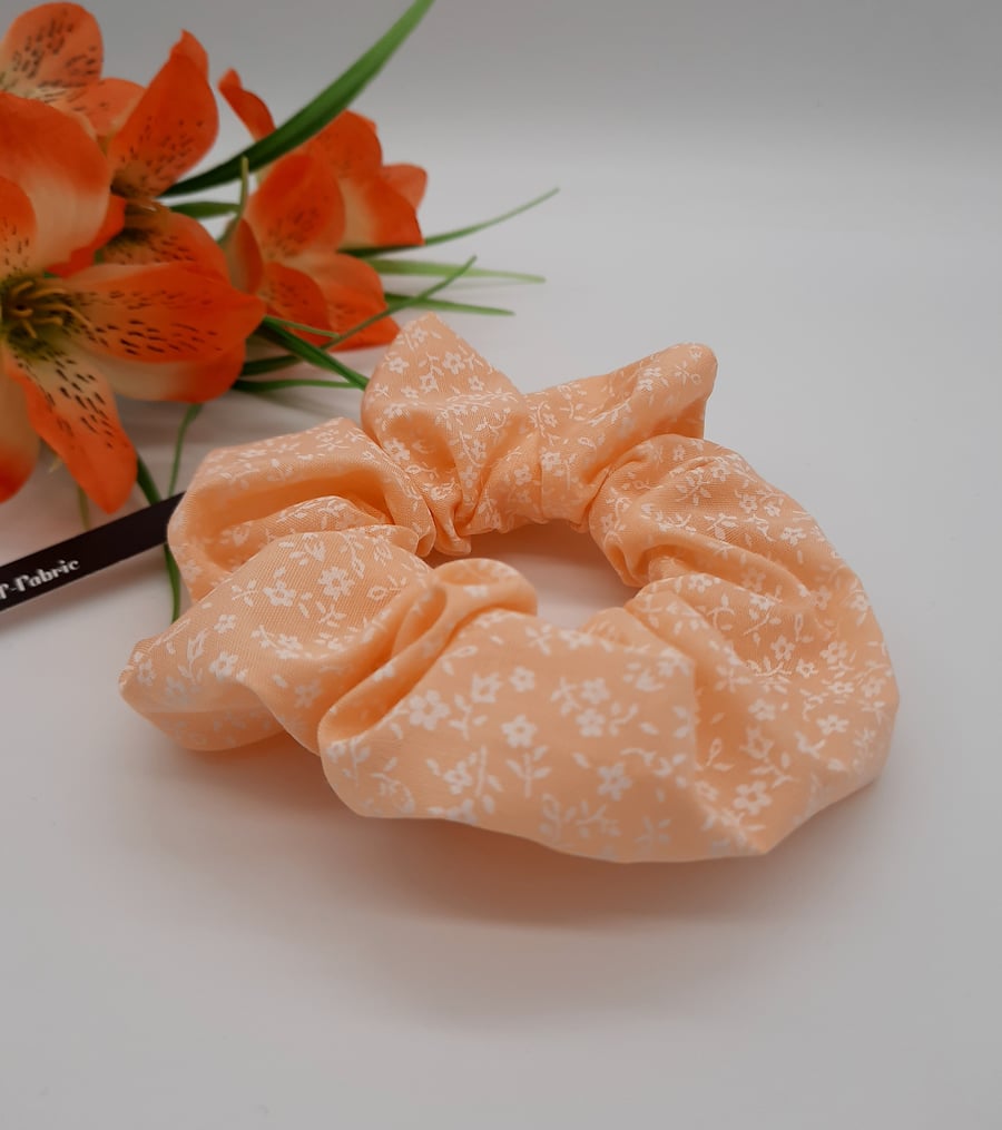 Scrunchie made using a peach and white floral fabric.  3 for 2 offer. 