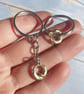 Bronze otter keyring of bright water  - Image 2