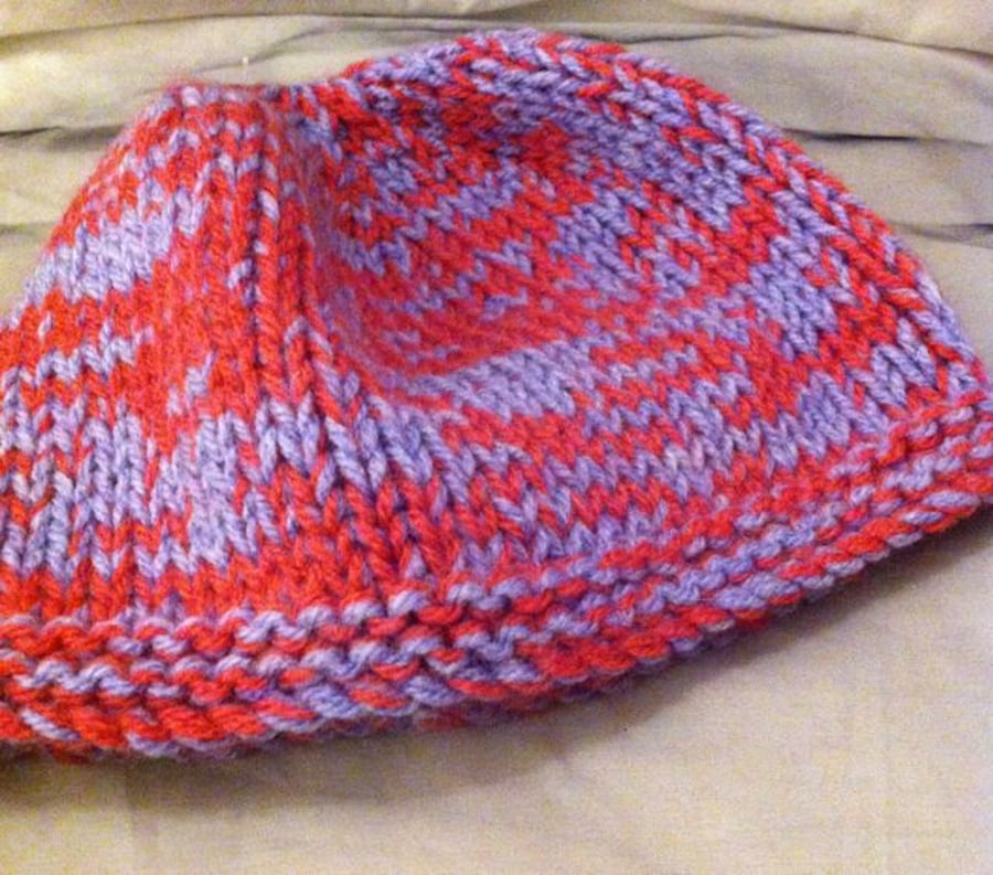 Little purple & pink knitted childs hat