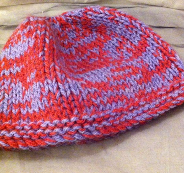 Little purple & pink knitted childs hat