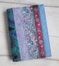 SOLD - A6 Reusable Patchwork Notebook Cover - Blues, Pinks & Purples - Image 1