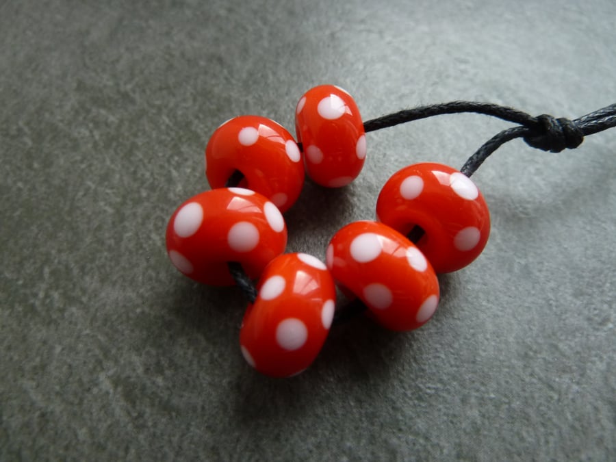 lampwork glass beads, orange and white spots