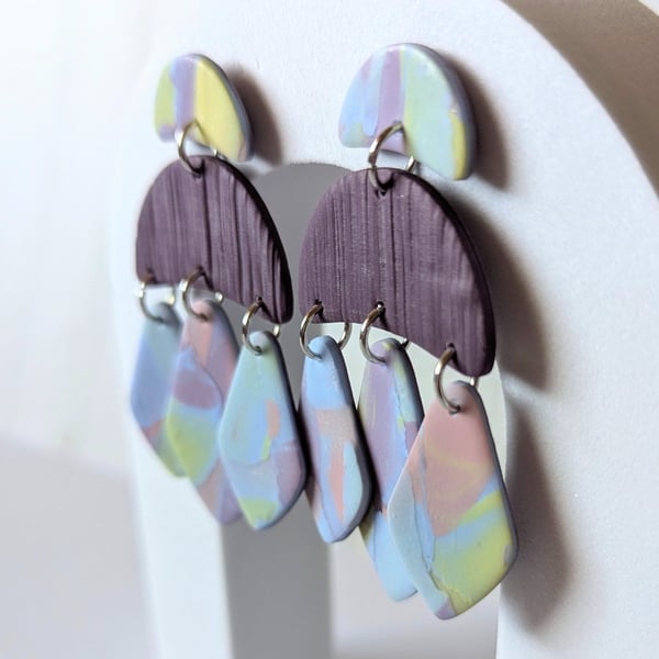 Triple dangles statement earrings.