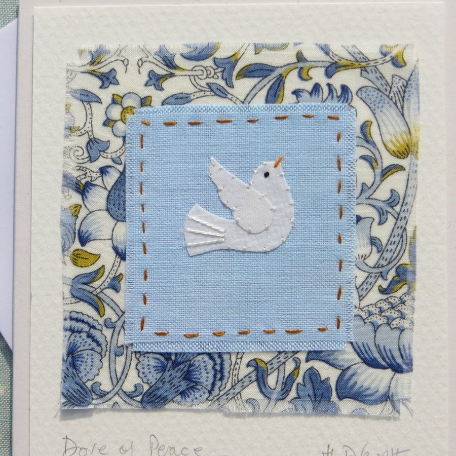 Dove of Peace hand stitched miniature with Liberty fabric background