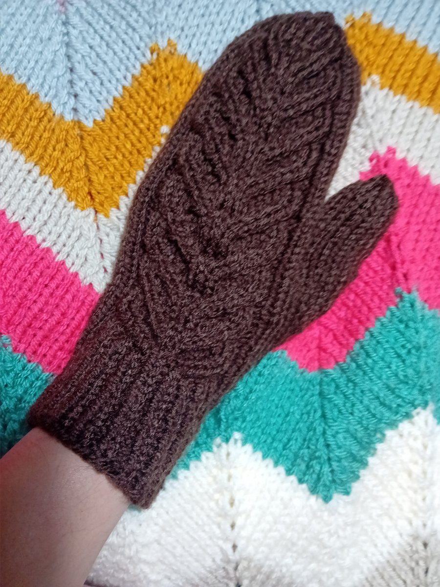 Hand knitted cable mittens