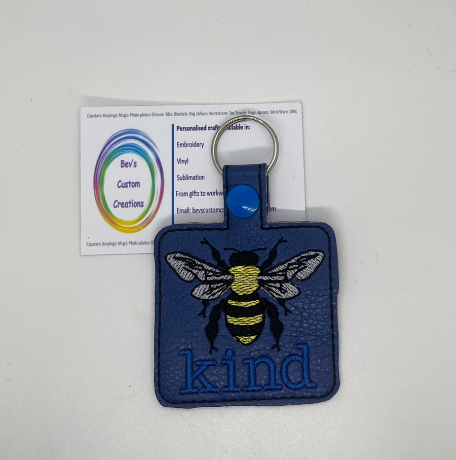 Embroidered Bee square blue