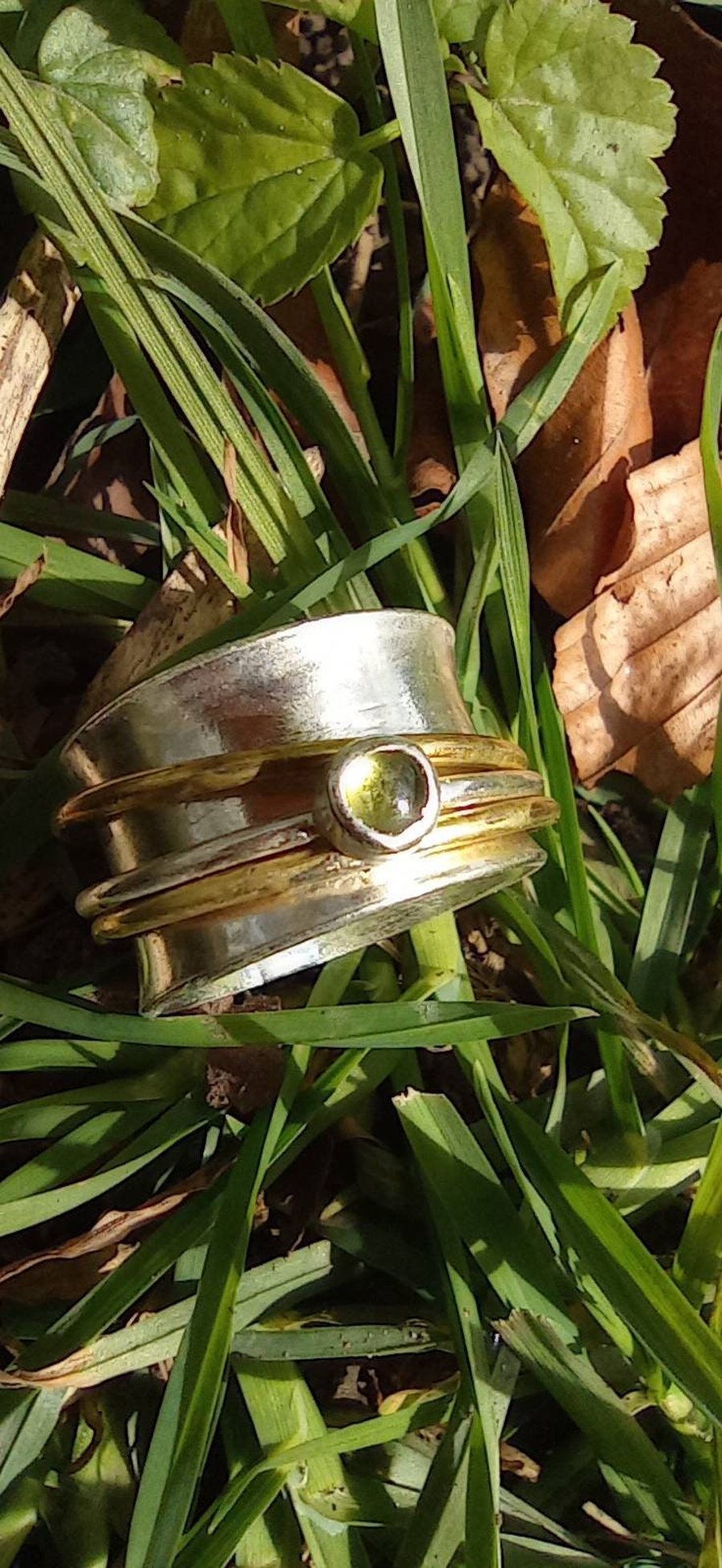 Silver spinner ring, chunky ring, silver peridot gemstone, anxiety ring. Spinner