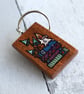 Books and fungi by candlelight. Pyrography key ring. - Image 2