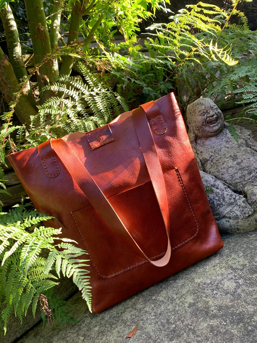 Handmade leather unisex chestnut brown tote bag. Versatile and stylish.