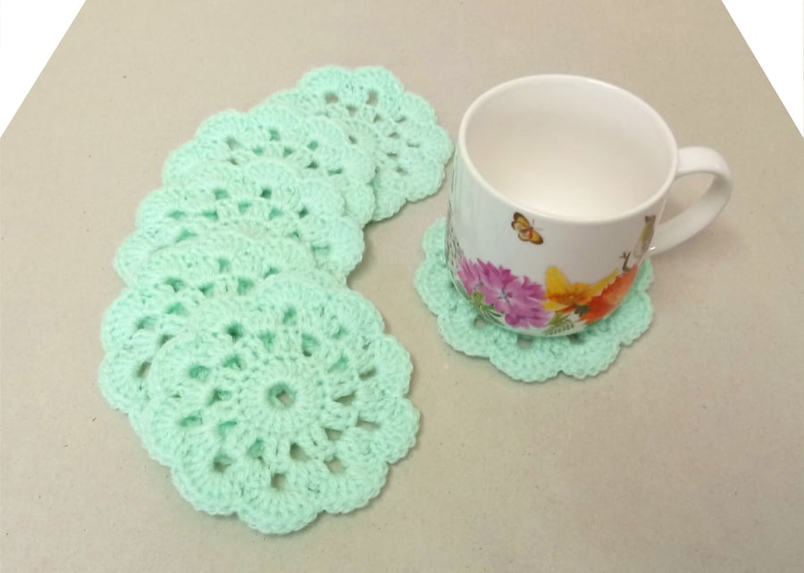 Coasters in a turquoise flower pattern, set of six, handmade table mats.
