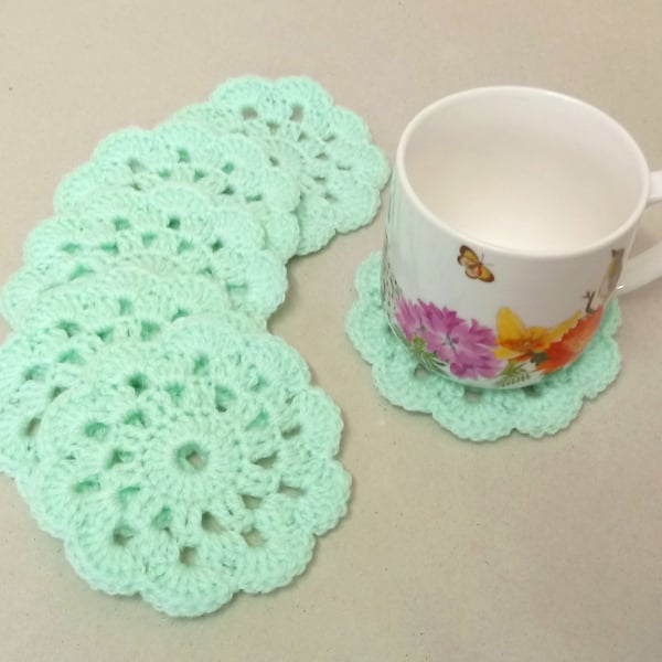 Coasters in a turquoise flower pattern, set of six, handmade table mats.