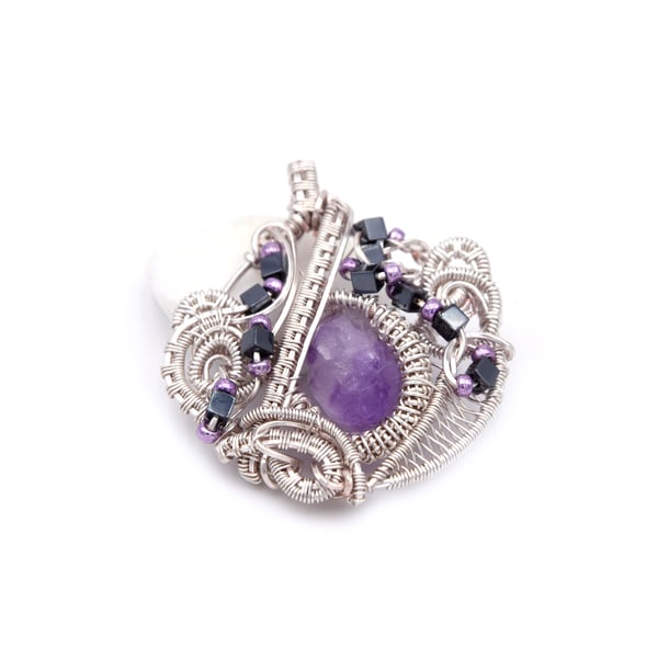 Amethyst pendant with purple and hematite accent beads