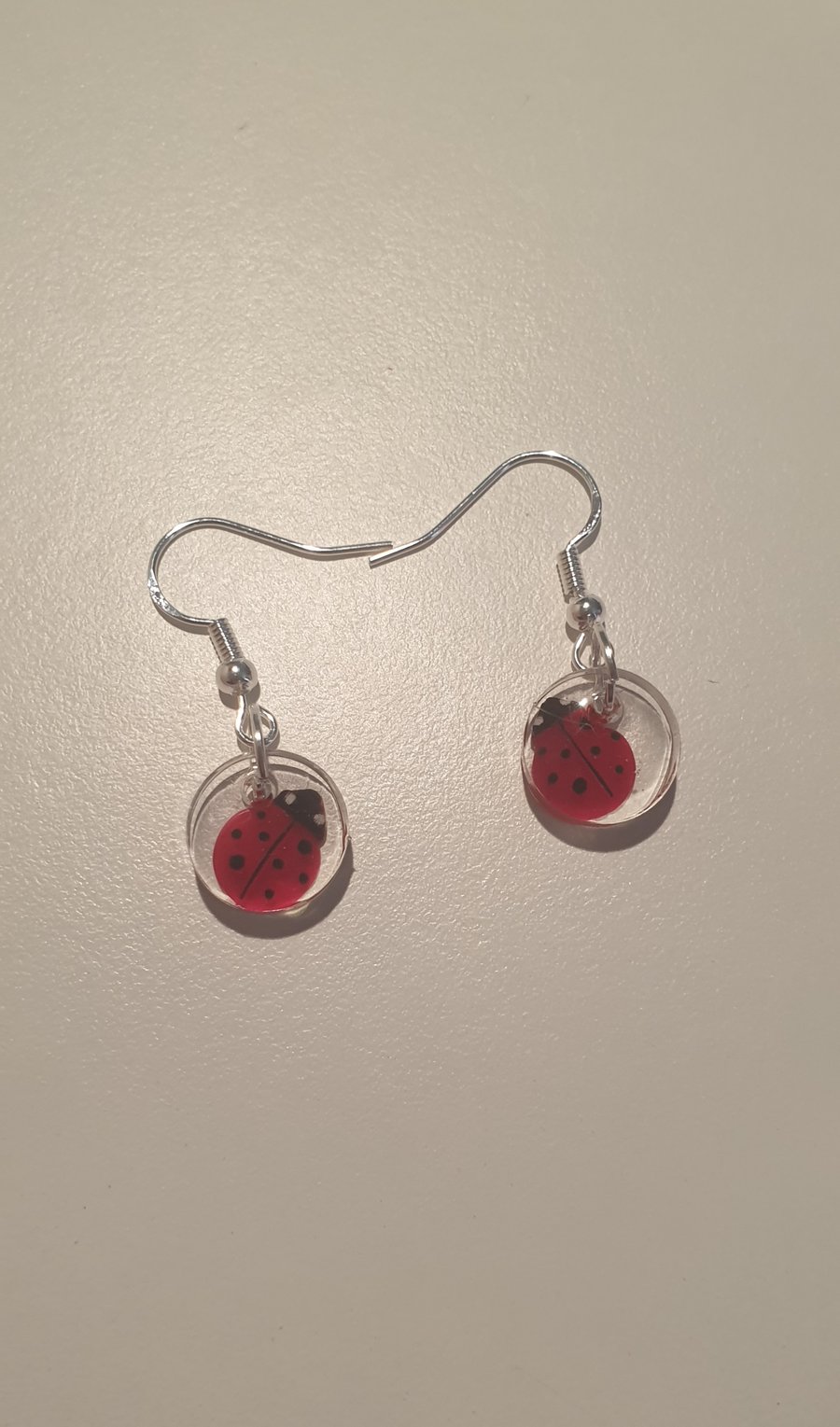 Round ladybird resin earrings