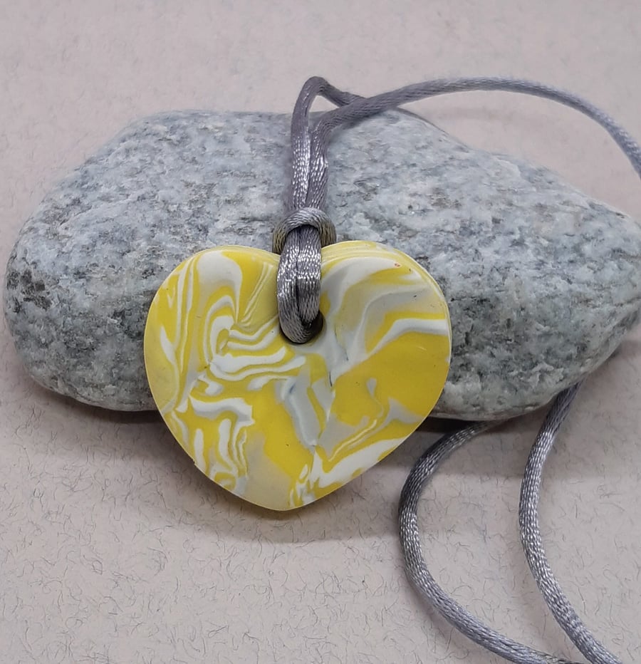 Heart shaped polymer clay pendant
