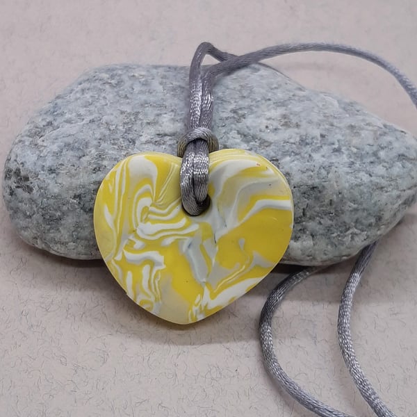 Heart shaped polymer clay pendant