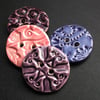 set of four large ceramic buttons shades of purple