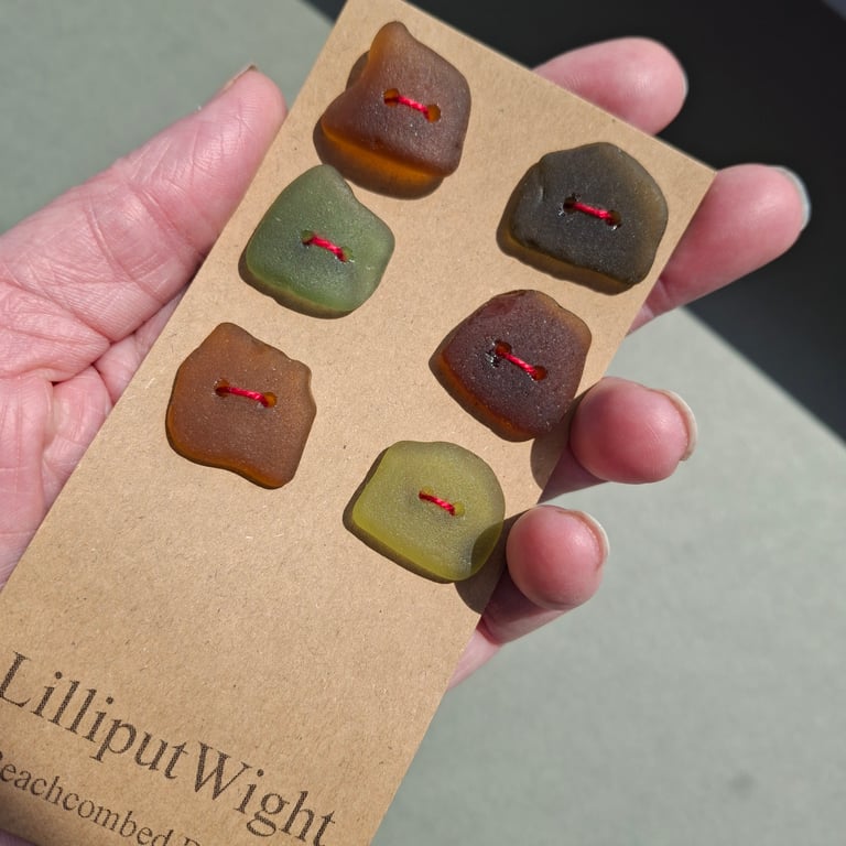 Set of six green and brown sea glass buttons