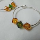 Silver Hoop earrings with green and orange  Swarovski bicone beads