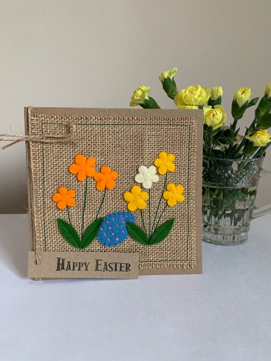 Easter greeting card with spring flowers and blue egg. Handmade. Wool felt.